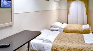 Гостиница Столичная Москва Двухместный номер эконом-класса с 2 отдельными кроватями и общей ванной комнатой-4